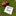 A white fringed towel with a maroon graphic and text lies on green grass next to a brown football. The blanket reads 'ROUGH TOUGH, REAL STUFF.