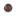 Round button with 'GIG EM' text on a brown background with white polka dots