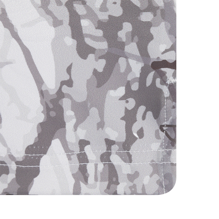 Zoomed in woodlands camo polo design and stitching