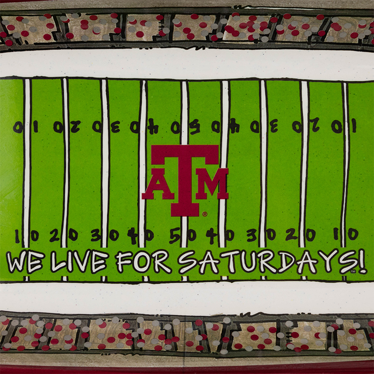 A square graphic print or poster featuring a hand-drawn football field design. The field is bright green with black yard lines, black numbers, and a large maroon 'ATM' logo in the center.