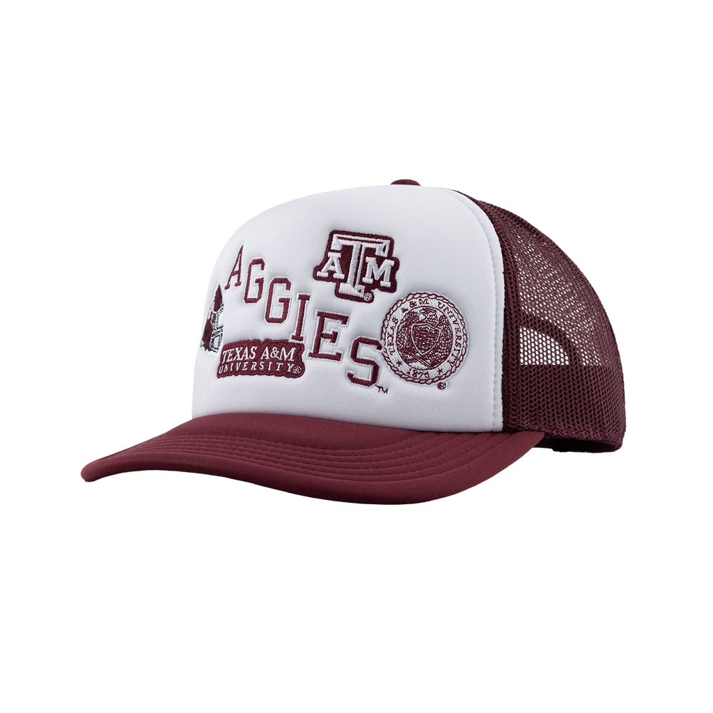 A maroon and white Texas A&M University trucker hat with embroidered lettering and logos on the front panel, shown against a plain white background.