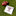 A white fringed towel with maroon printed text and mascot artwork lies on green turf beside a brown leather football. The blanket reads “ROUGH TOUGH REAL STUFF.