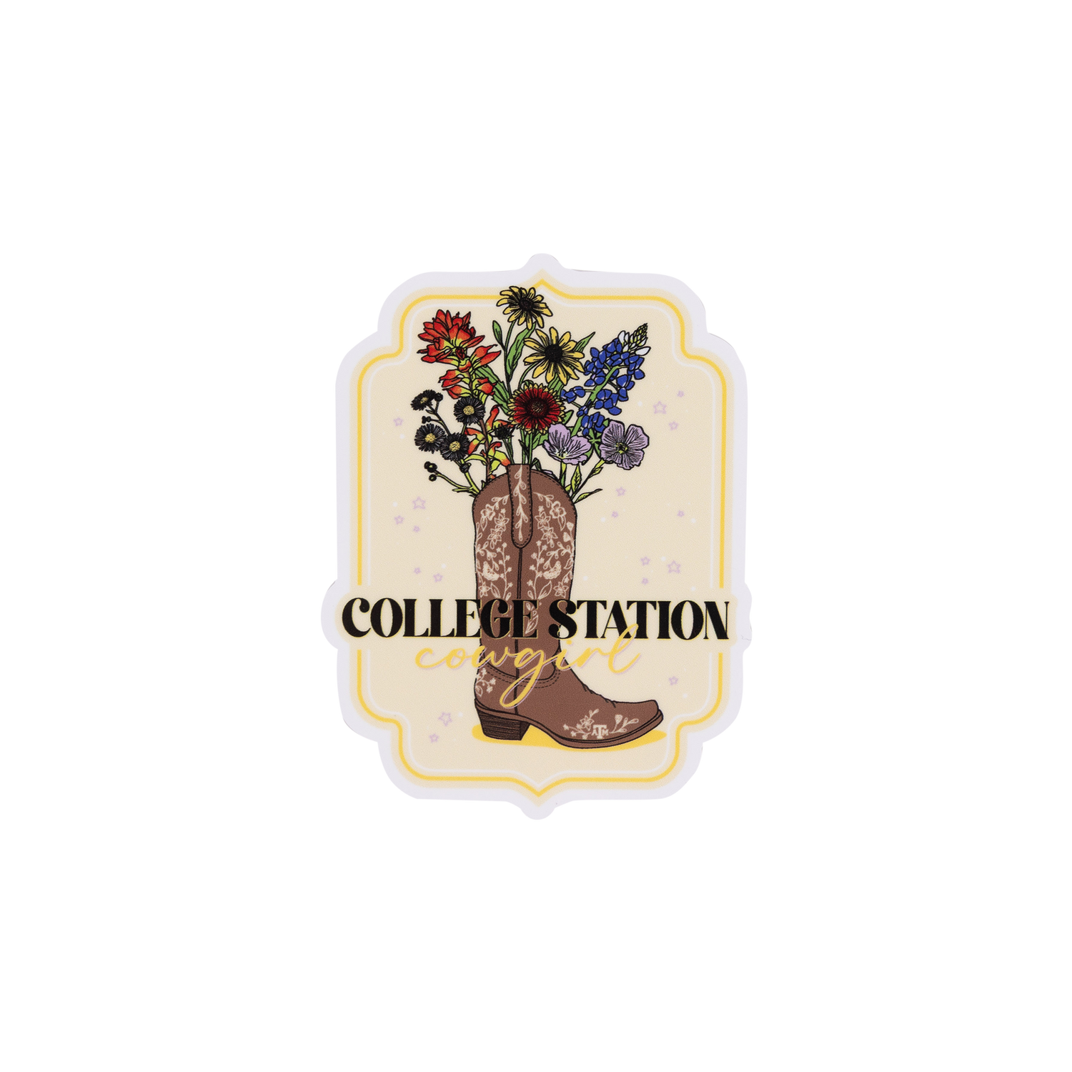 A die-cut sticker featuring an illustration of a brown cowboy boot filled with a colorful wildflower bouquet, with the text 'COLLEGE STATION' across the center. The sticker has a scalloped cream border with subtle gold glitter-like speckles and is shown on a plain white background.