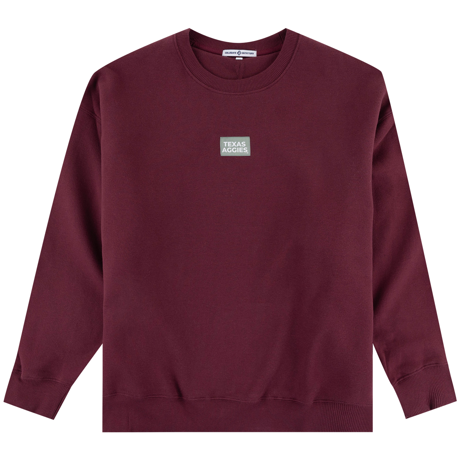 A crewneck sweatshirt in maroon with a small green rectangular chest patch that reads 'TEXAS A&M'. The sweatshirt is photographed flat against a solid white background.