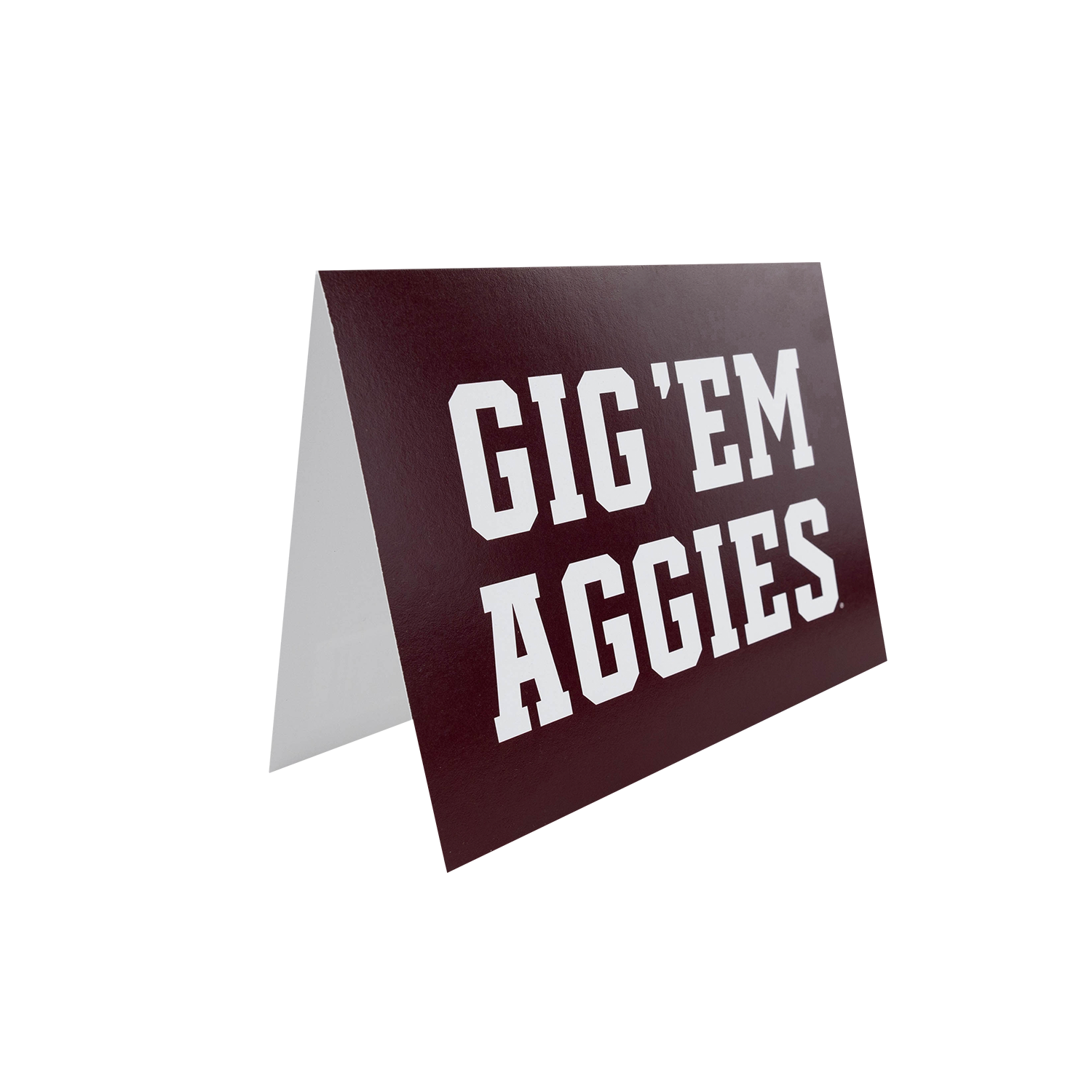 A blank card with a dark maroon front and bold white text reading “GIG’EM AGGIES,” shown on a plain white background.