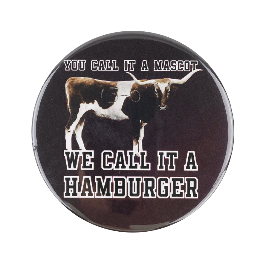 Maroon button with "You call it a mascot, we call it a hamburger" in black with a longhorn