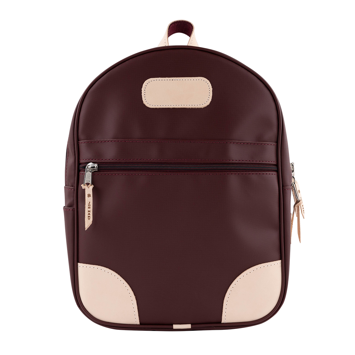 A dark burgundy leather backpack with light beige accents, including a top handle, a rectangular patch on the front, a zipper pull tab, and curved corner protectors.