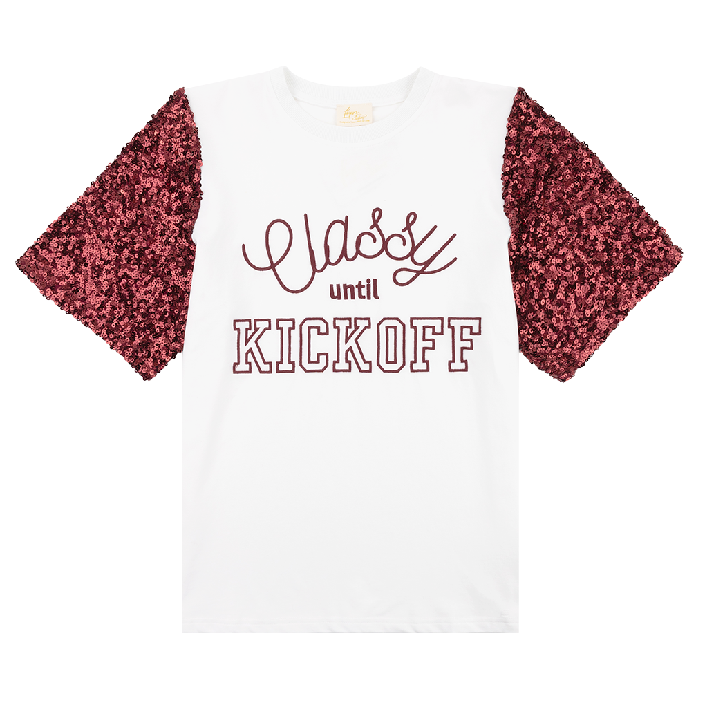 White tee with maroon sequined sleeves. "Classy Until Kickoff" is in maroon