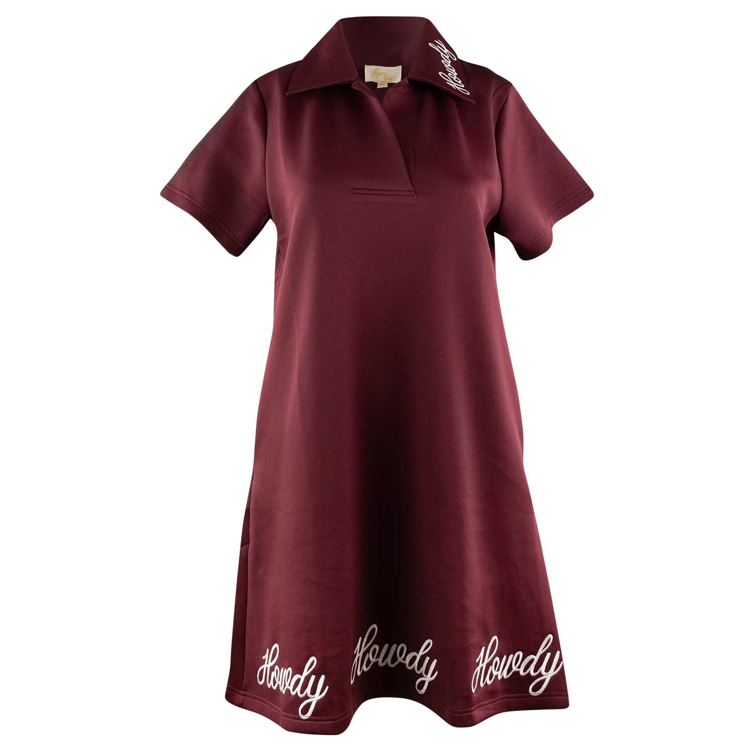 A short-sleeve polo dress in burgundy with white embroidered script text reading 'Howdy' along the hem and a small white embroidered floral detail near the collar, shown on a plain white background.