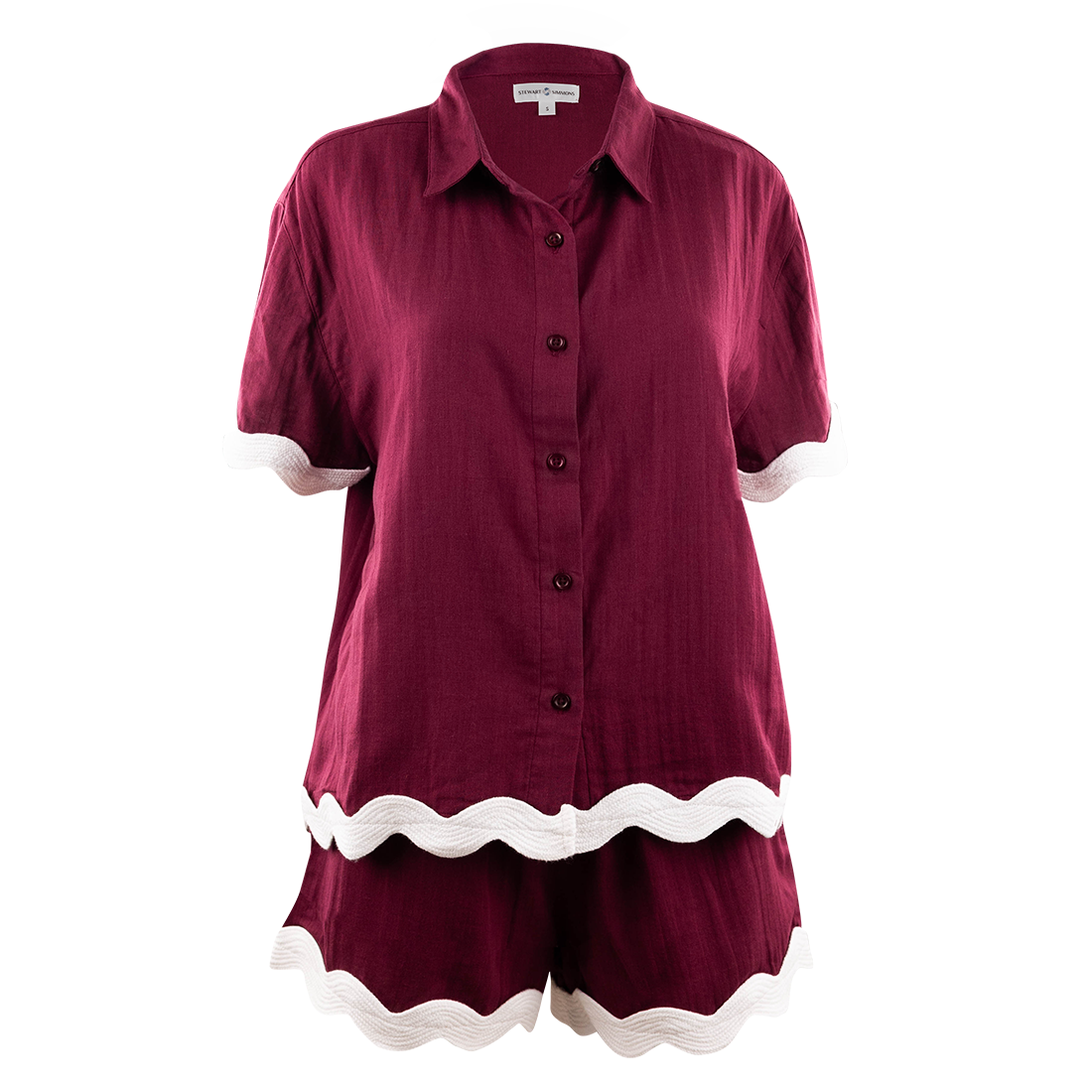 Maroon top and shorts set with white waves on the edges of items