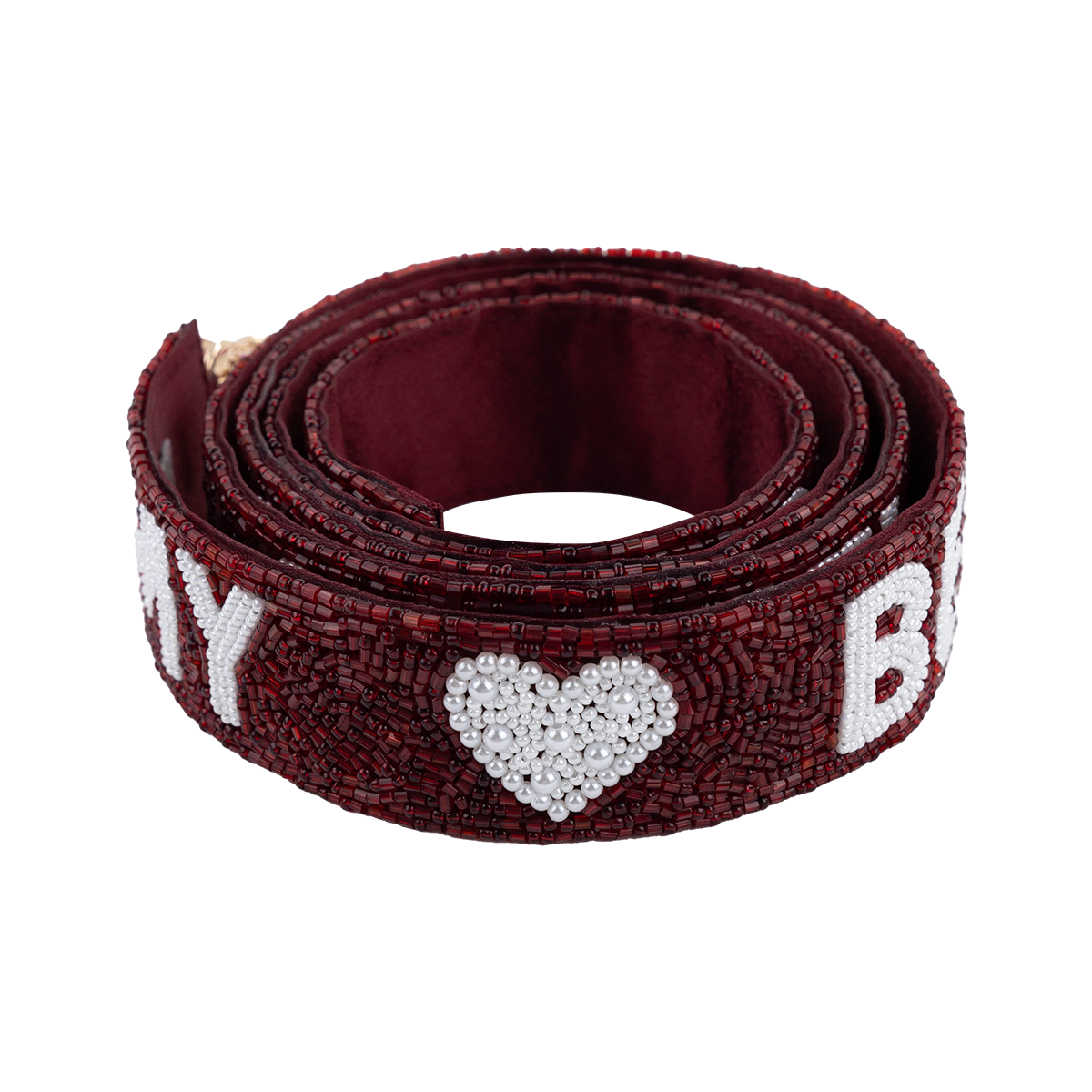 A rolled-up burgundy beaded belt featuring white lettering and a white heart made of clear rhinestones, shown 