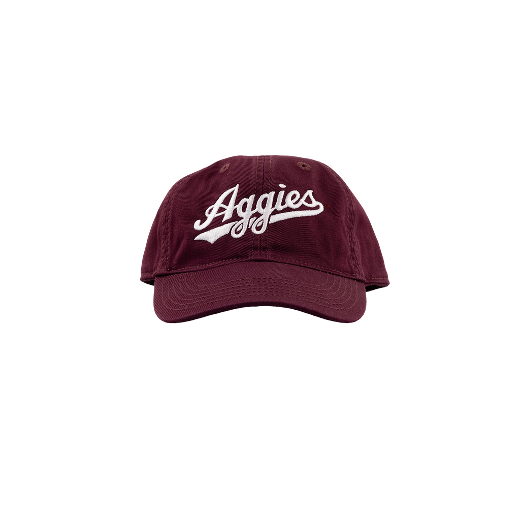 front of maroon hat with white script Aggies text