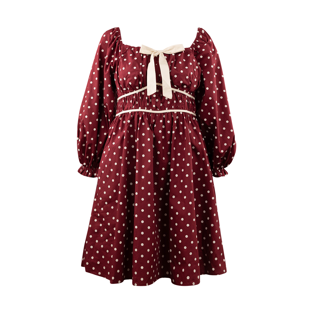 Maroon polka dot dress with long sleeves and a cream bow.