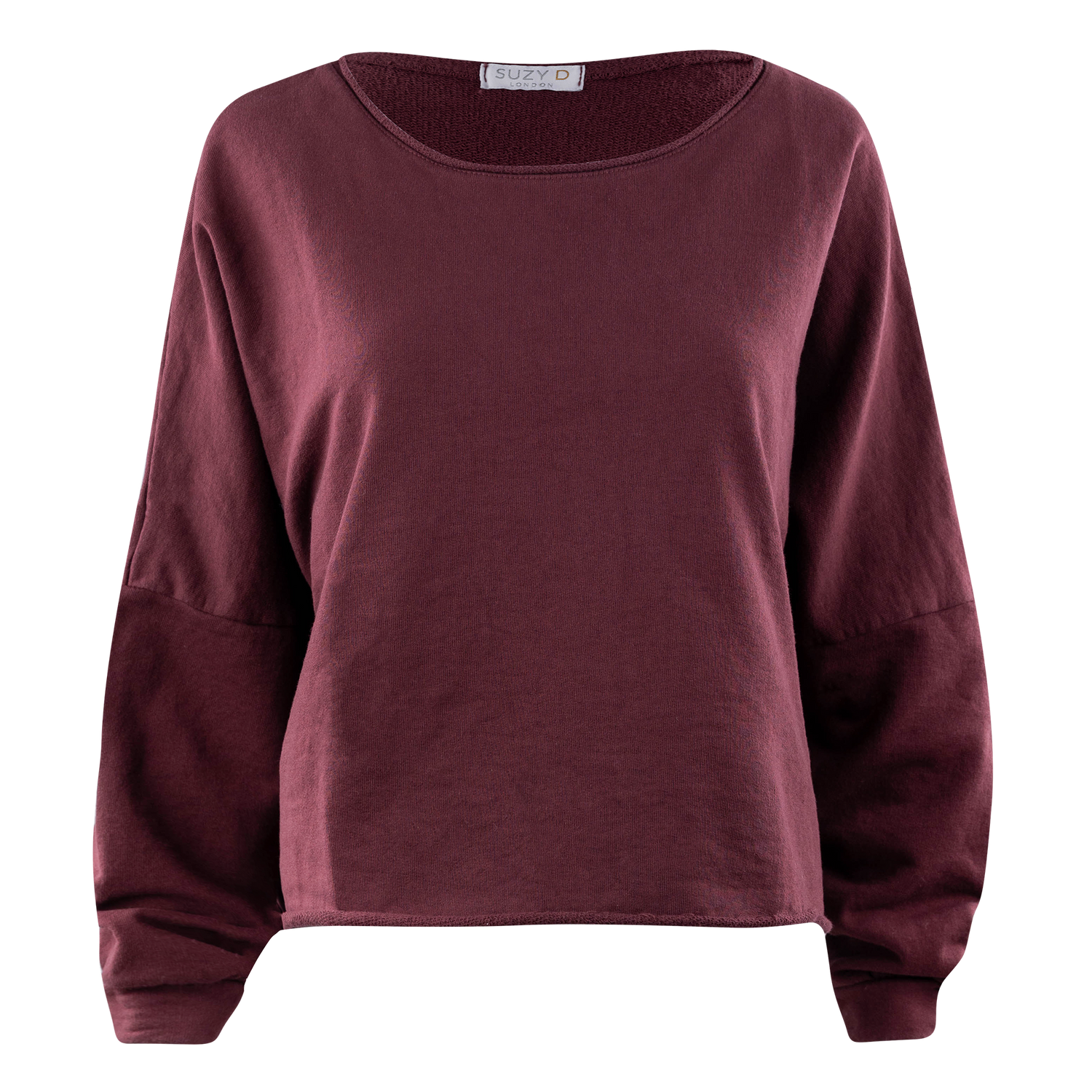 Maroon Suzy D London long-sleeve top featuring a wide scoop neckline, relaxed fit, soft knit fabric, and wide cuffs.