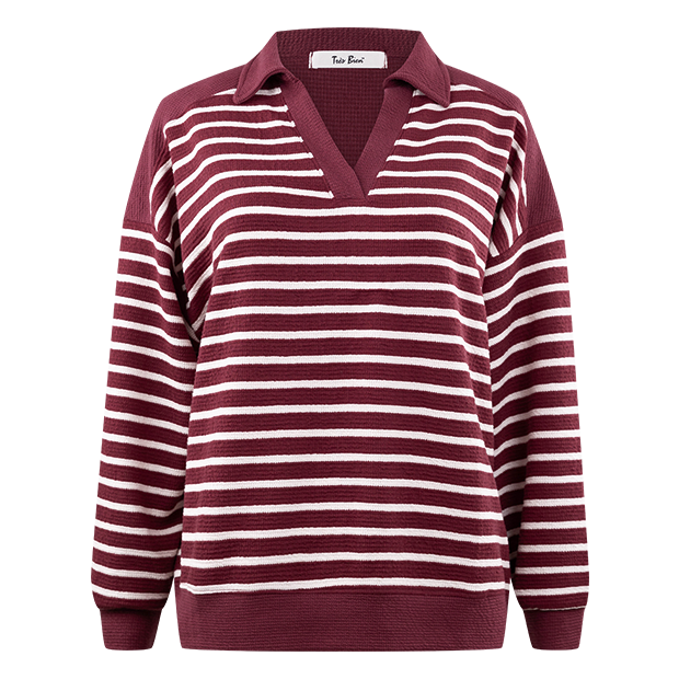 Maroon and white striped sweater with a brand label.