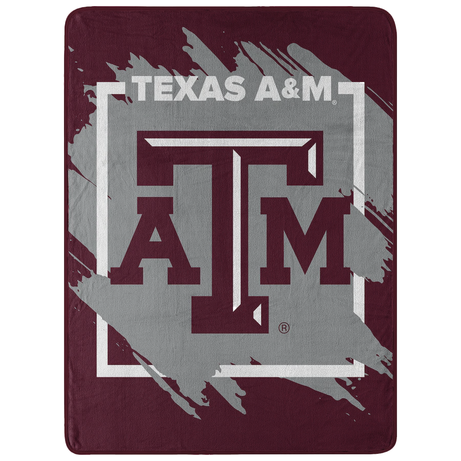 Texas A&M maroon throw blanket with lettering in gray and maroon.