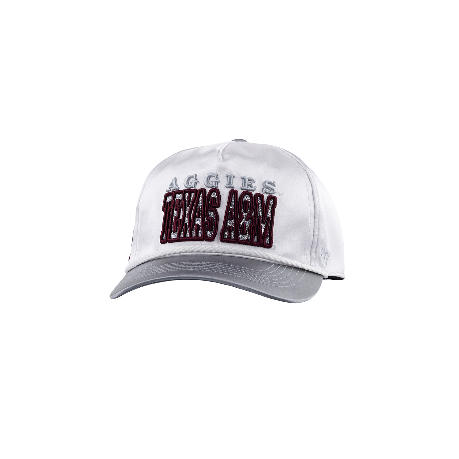 A white baseball cap with a gray visor and gray embroidered 'AGGIES' text above large maroon and white 'TEXAS A&M' lettering on the front.