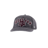 A dark gray baseball cap featuring 'TEXAS A&M' and the 'A&M' logo embroidered on the front in maroon with a white outline. The side of the cap displays a small white '47' logo.