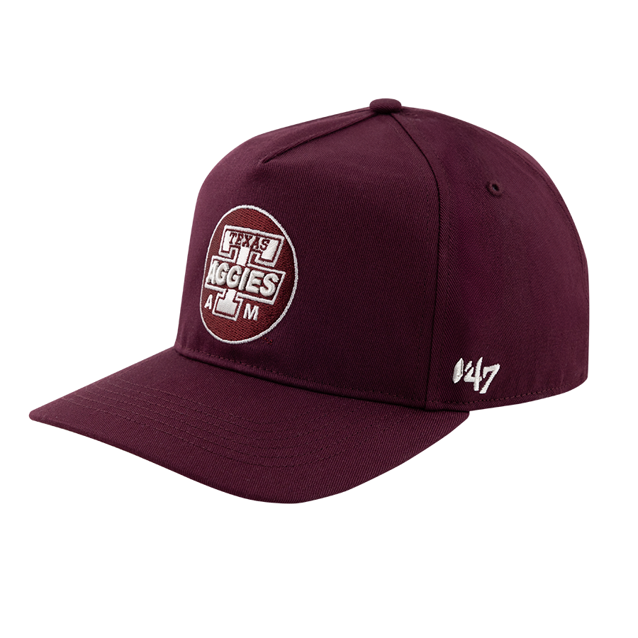 Maroon hat with maroon patch with white block T that reads "Texas Aggies"