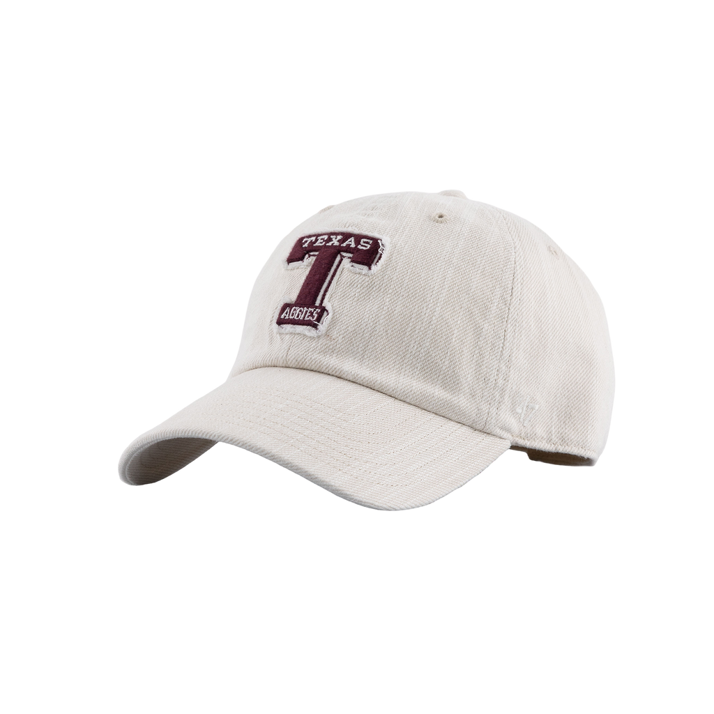 Cream Texas A&M cap featuring a maroon embroidered Texas A&M “T” logo with “TEXAS” and “AGGIES” lettering.