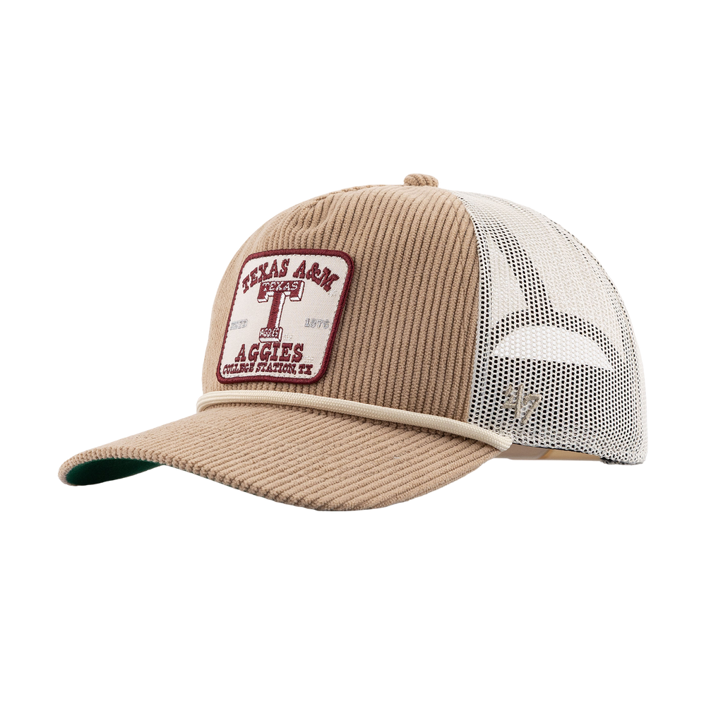 A tan corduroy trucker hat with white mesh back panels and a front patch reading 'Texas A&M Aggies'.