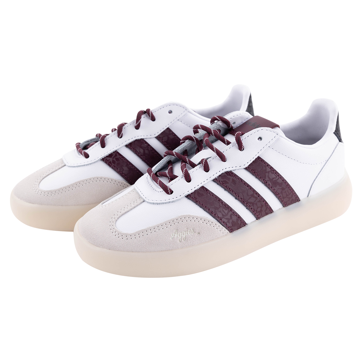 White shoes with maroon stripes on the side and maroon with white accents on the laces.