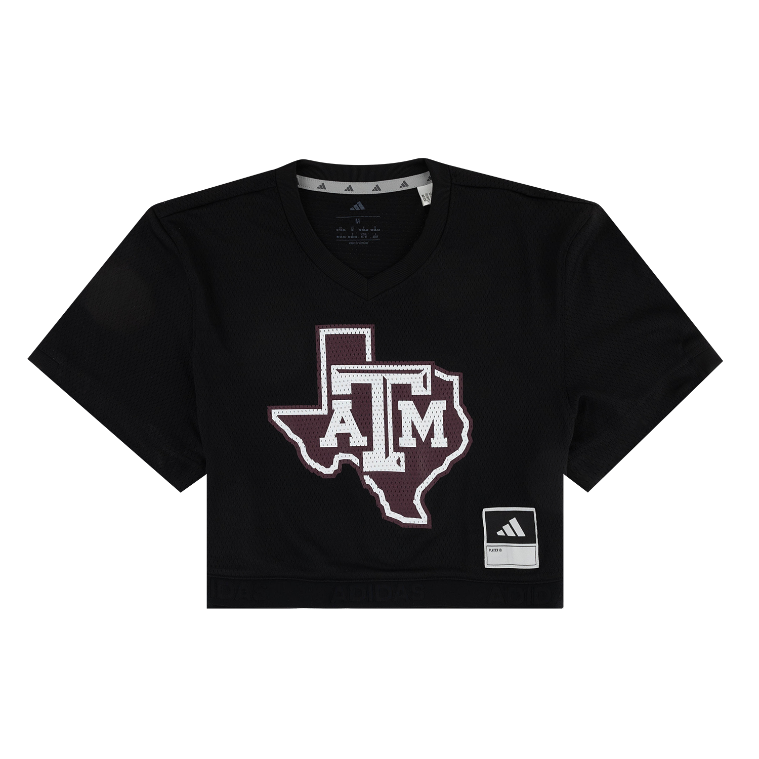 A black short-sleeve cropped V-neck t-shirt featuring a large Texas A&M 'A&M' logo in maroon and white on the front, with an Adidas brand patch on the lower right hem.