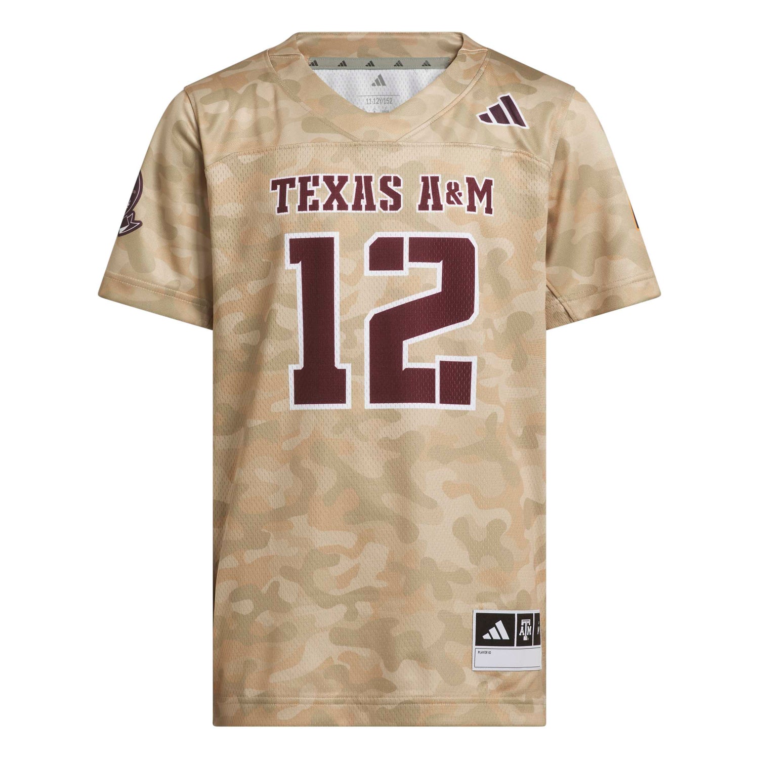 An Adidas Texas A&M football jersey in a desert camouflage pattern, featuring 'TEXAS A&M' and the number '12' in maroon with white outlines on the front.