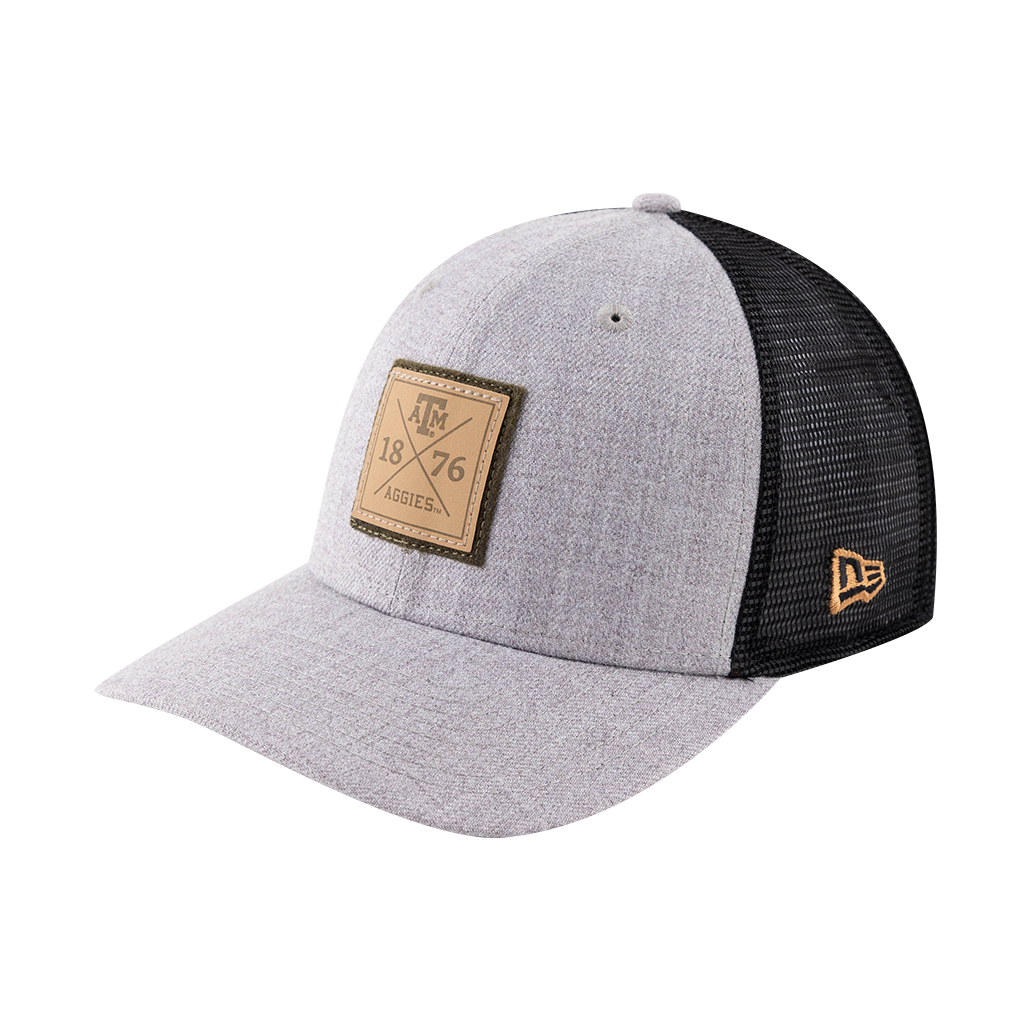 Gray hat with black mesh backing. Khaki patch that has "AGGIES"