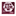 Maroon plush square pillow with white hexagon shapes and an ATM logo and "Texas A&M Aggies"