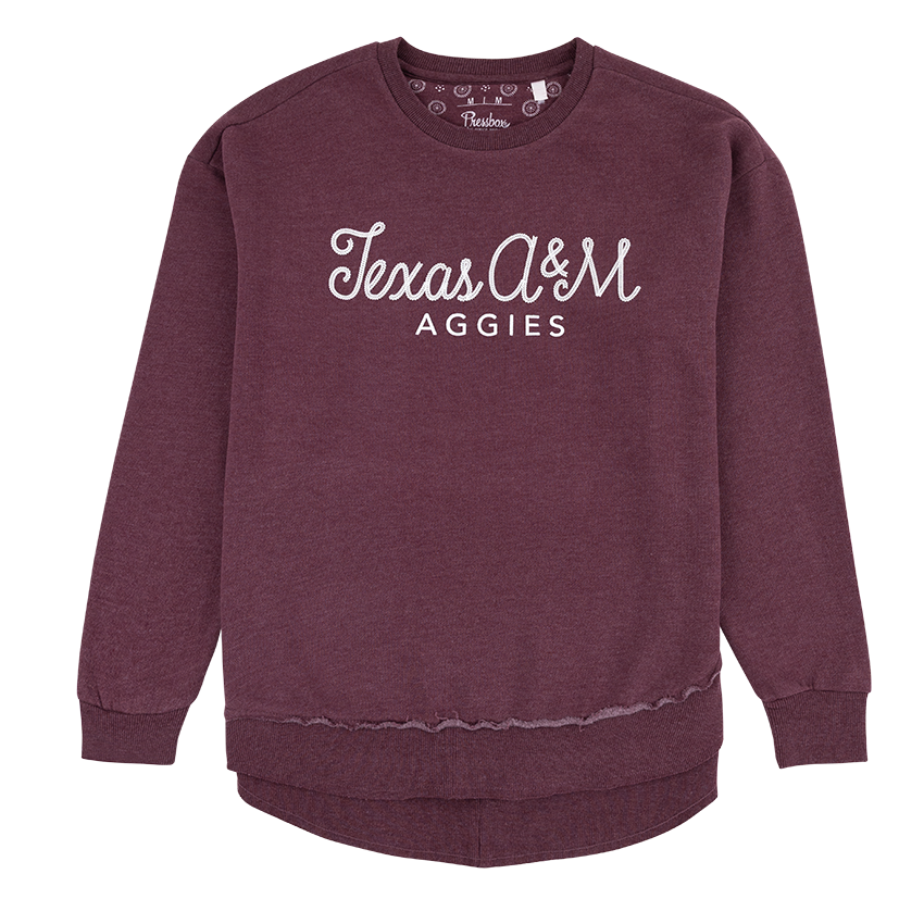 Maroon sweatshirt with script "Texas A&M" and "Aggies" in white.