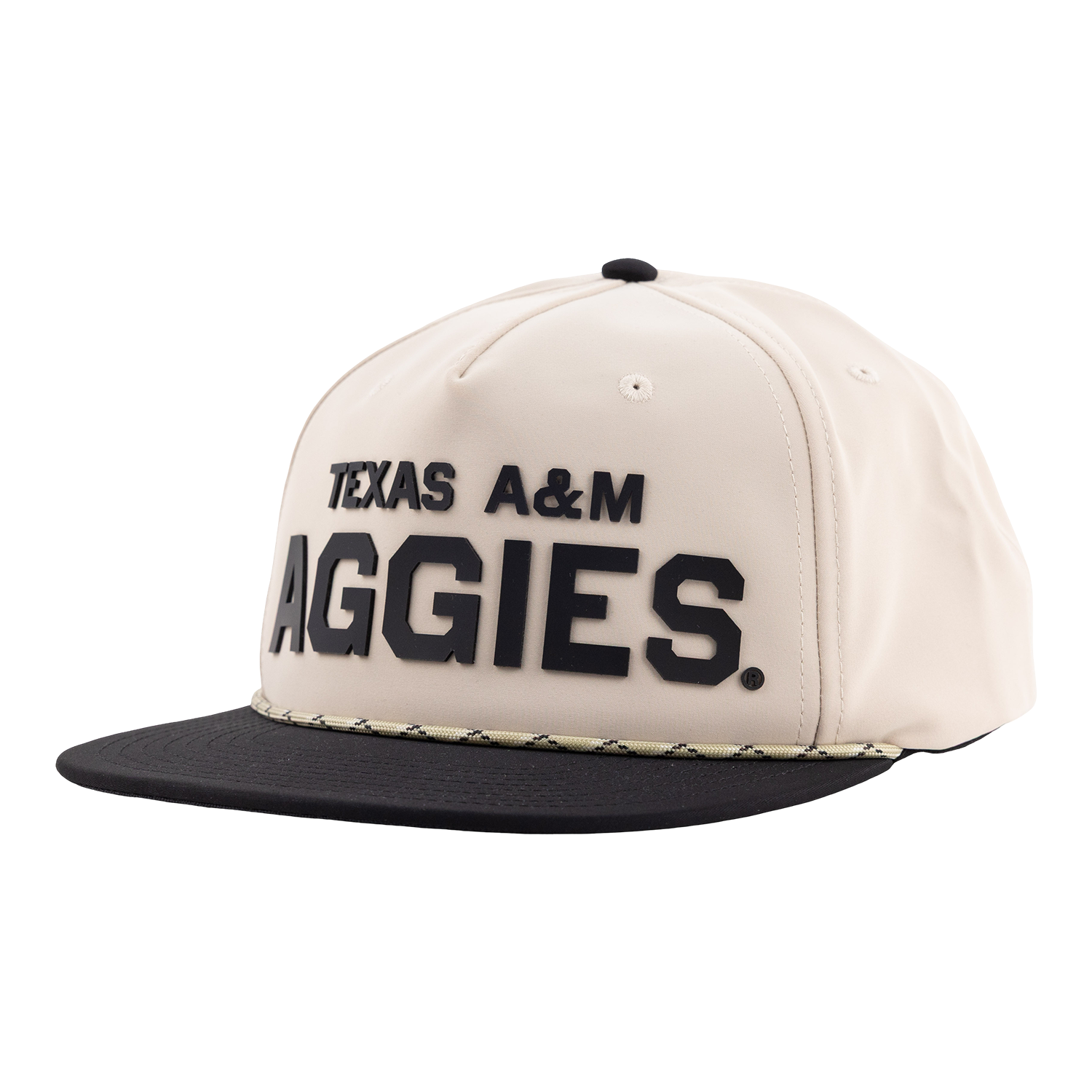 Texas A&M Aggies cream and black structured cap featuring bold raised “AGGIES” lettering and a patterned trim along the brim.