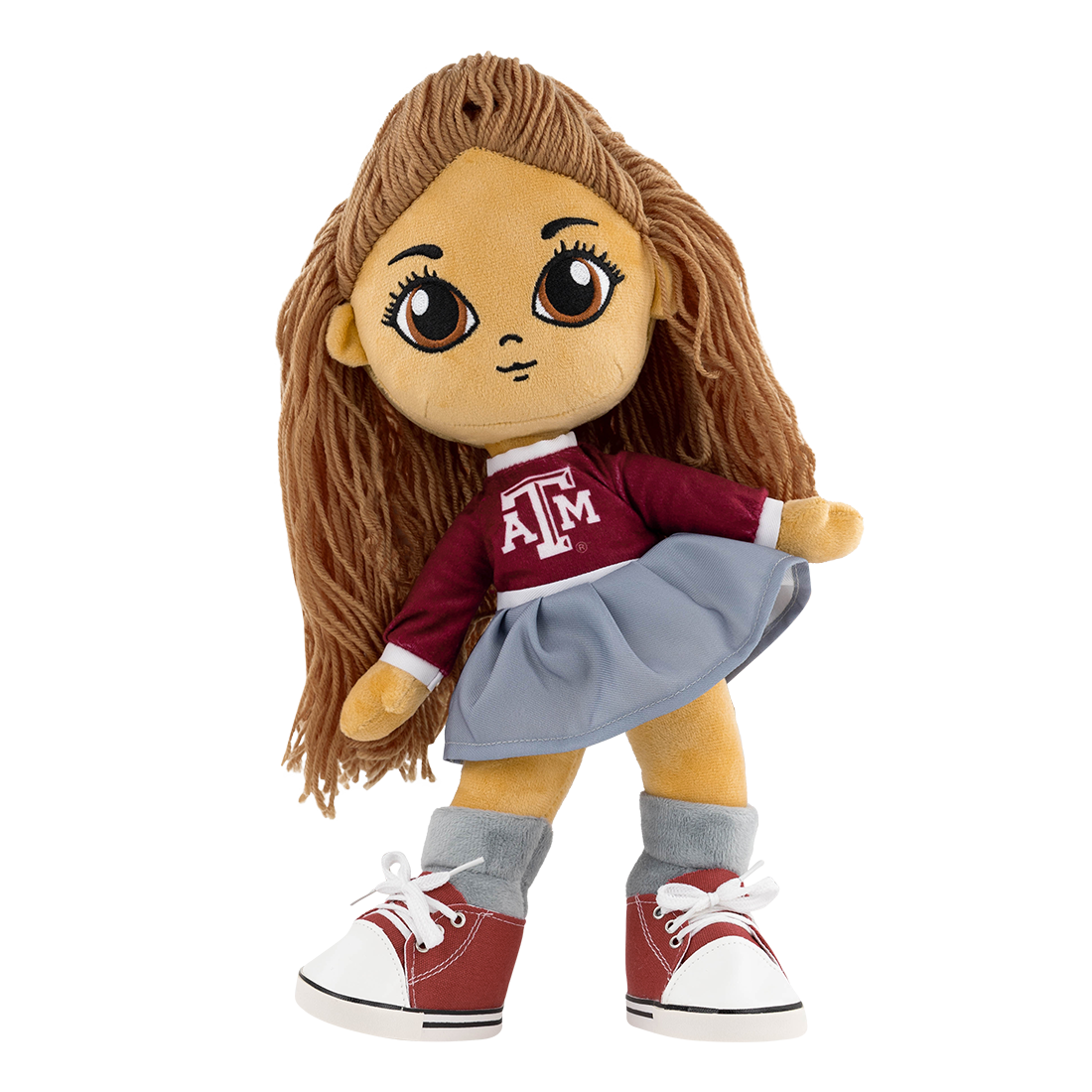 Plush doll with maroon shirt and gray skirt 