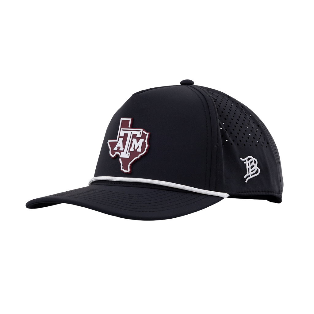 A black baseball cap featuring a Texas A&M 'A&M' logo in maroon and white on the front, with a white piping accent along the brim and a white embroidered 'B' logo on the side. The cap has perforated side panels and is shown on a plain white background.