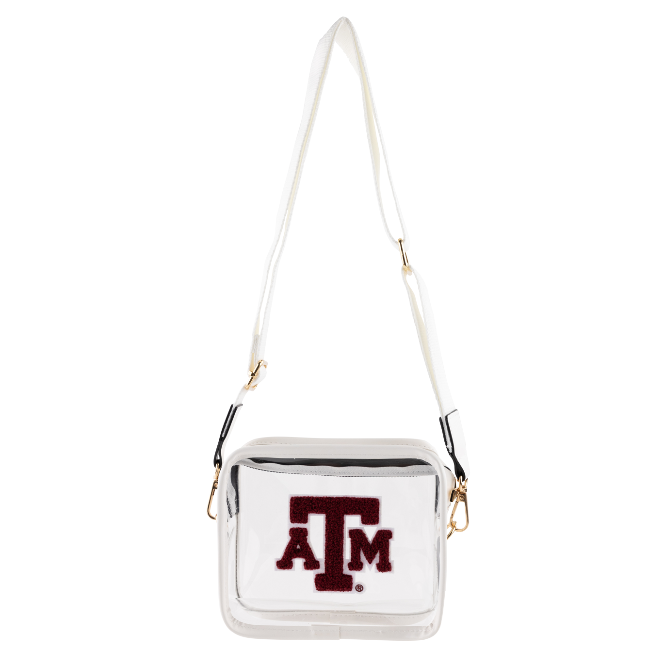 A clear square crossbody purse with gold hardware. The purse comes with a white strap. A&M is printed in maroon fuzzy block letters on the front. 