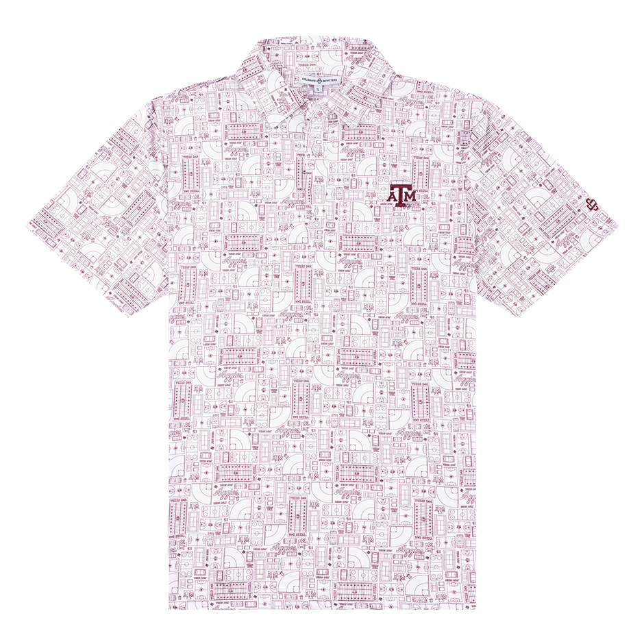 White polo with the Texas A&M logo on the upper left chest in maroon and tiny maroon lay outs of Kyle Field.