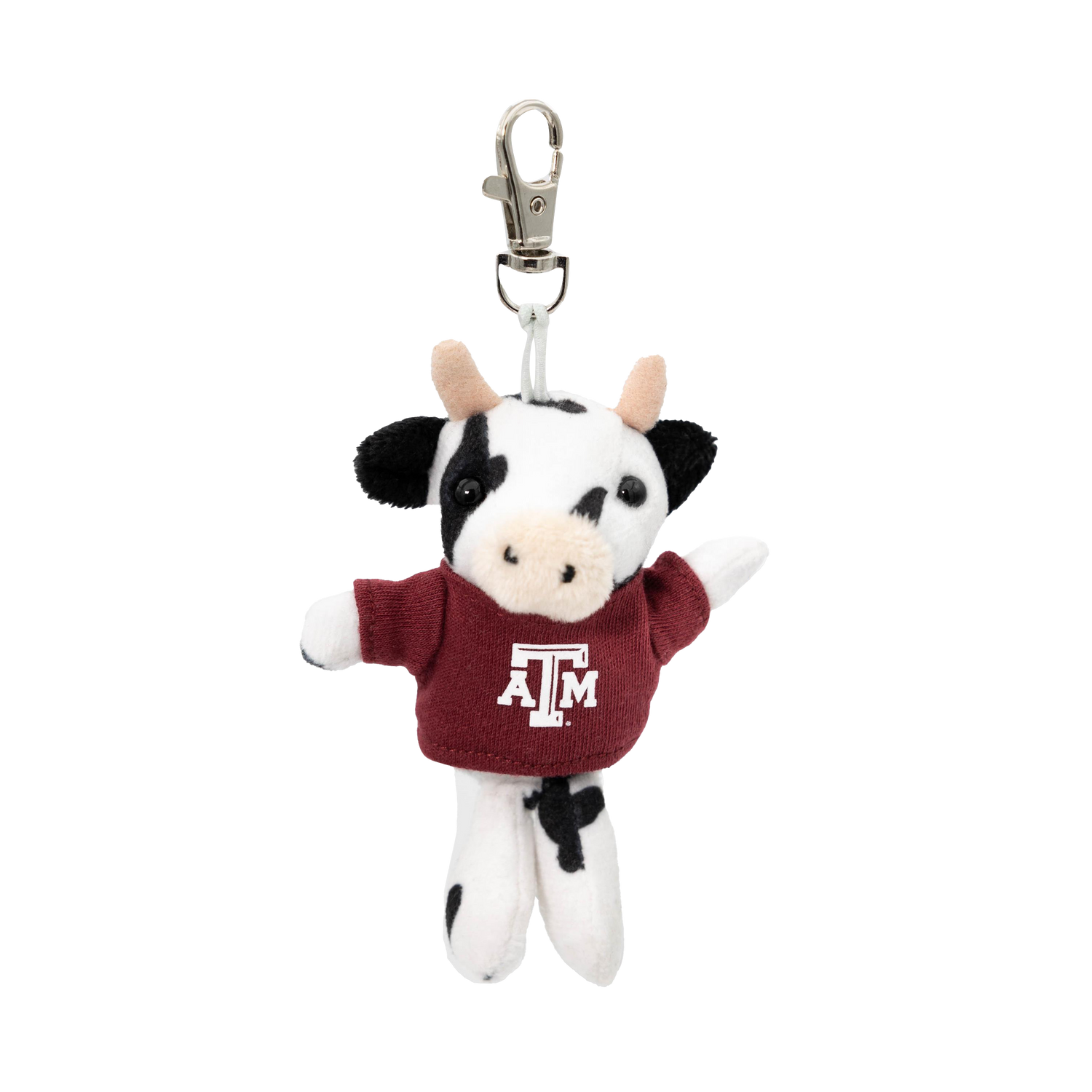 A small plush cow keychain or bag charm with a silver clasp. The cow is black and white with a maroon shirt featuring a white 'A&M' logo, representing the Texas A&M Aggies.