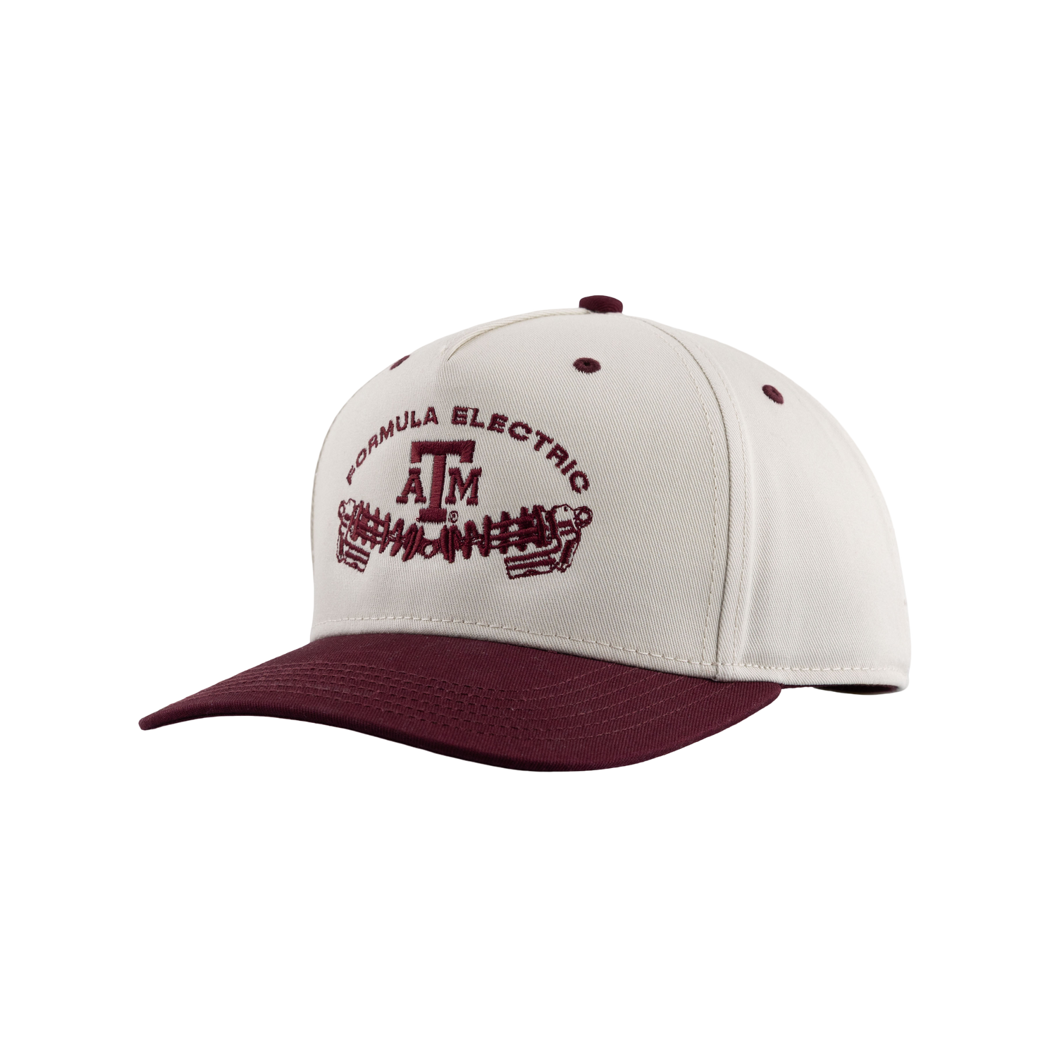 Two-tone snapback cap with a cream crown and maroon brim, embroidered on the front panel with a maroon 'Formula Electric' text arched above a Texas A&M 'ATM' logo, sitting above a graphic of an electric motor or gear-and-coil assembly.