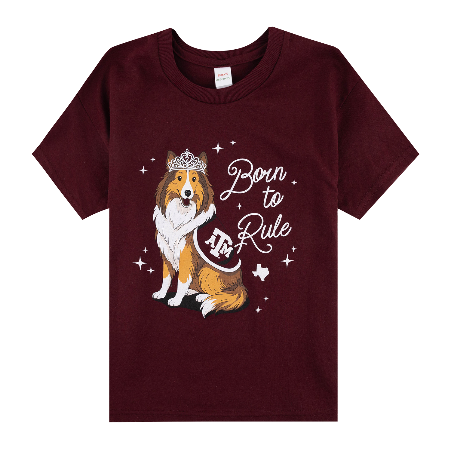 Maroon Texas A&M T-shirt featuring a crowned cartoon collie wearing an A&M cape, surrounded by stars and a Texas silhouette, with white “Born to Rule” lettering.