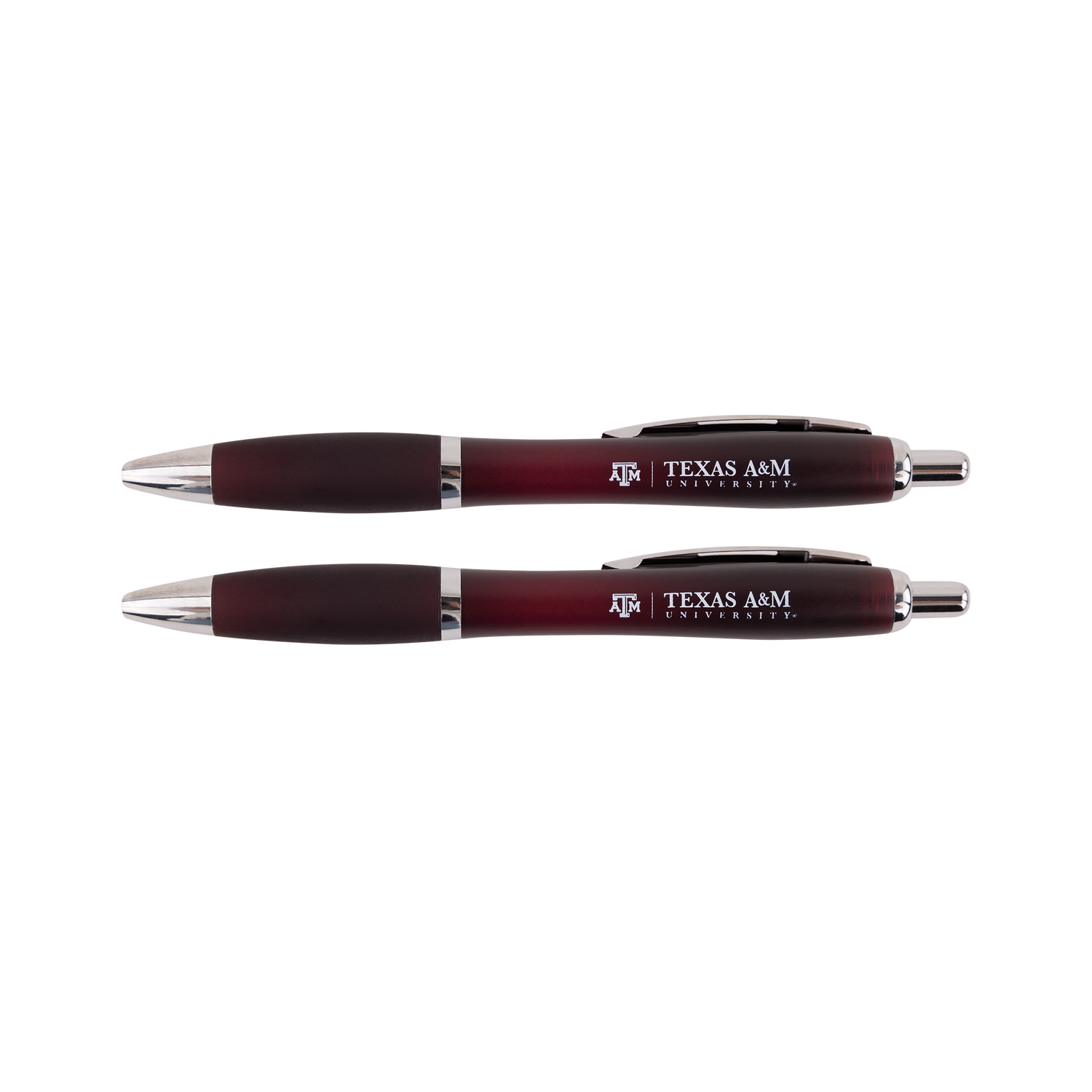Two maroon and silver ballpoint pens with 'Texas A&M University' branding, displayed horizontally on a plain white background.