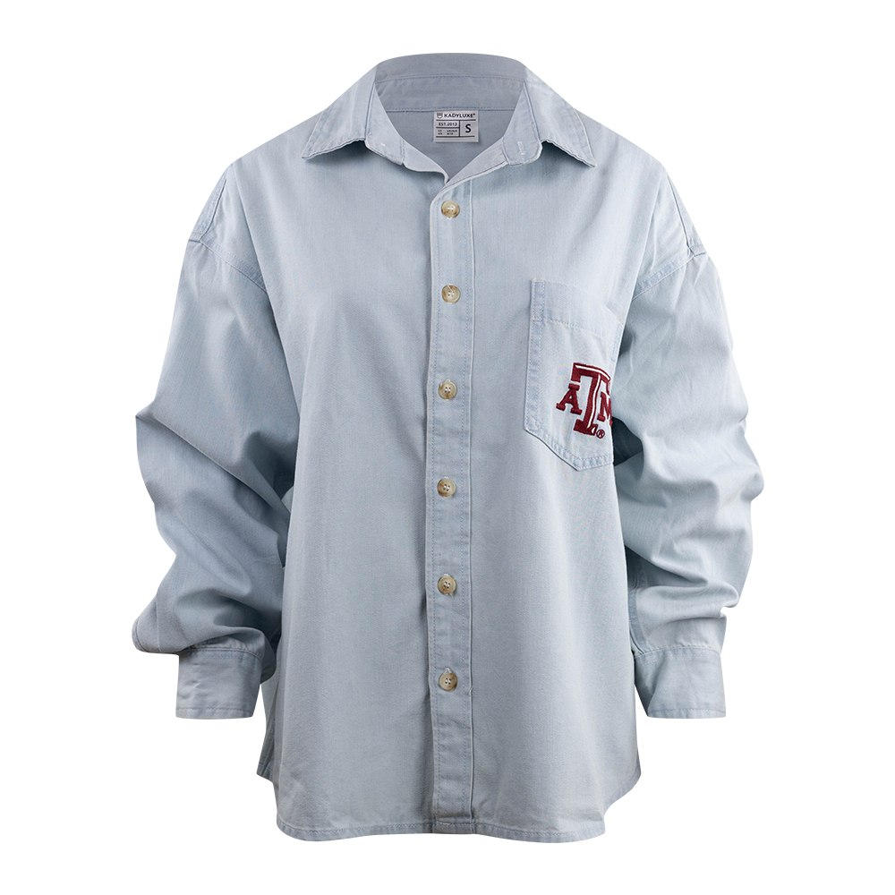 Light blue button-up shirt with the Texas A&M logo on the chest pocket in maroon.