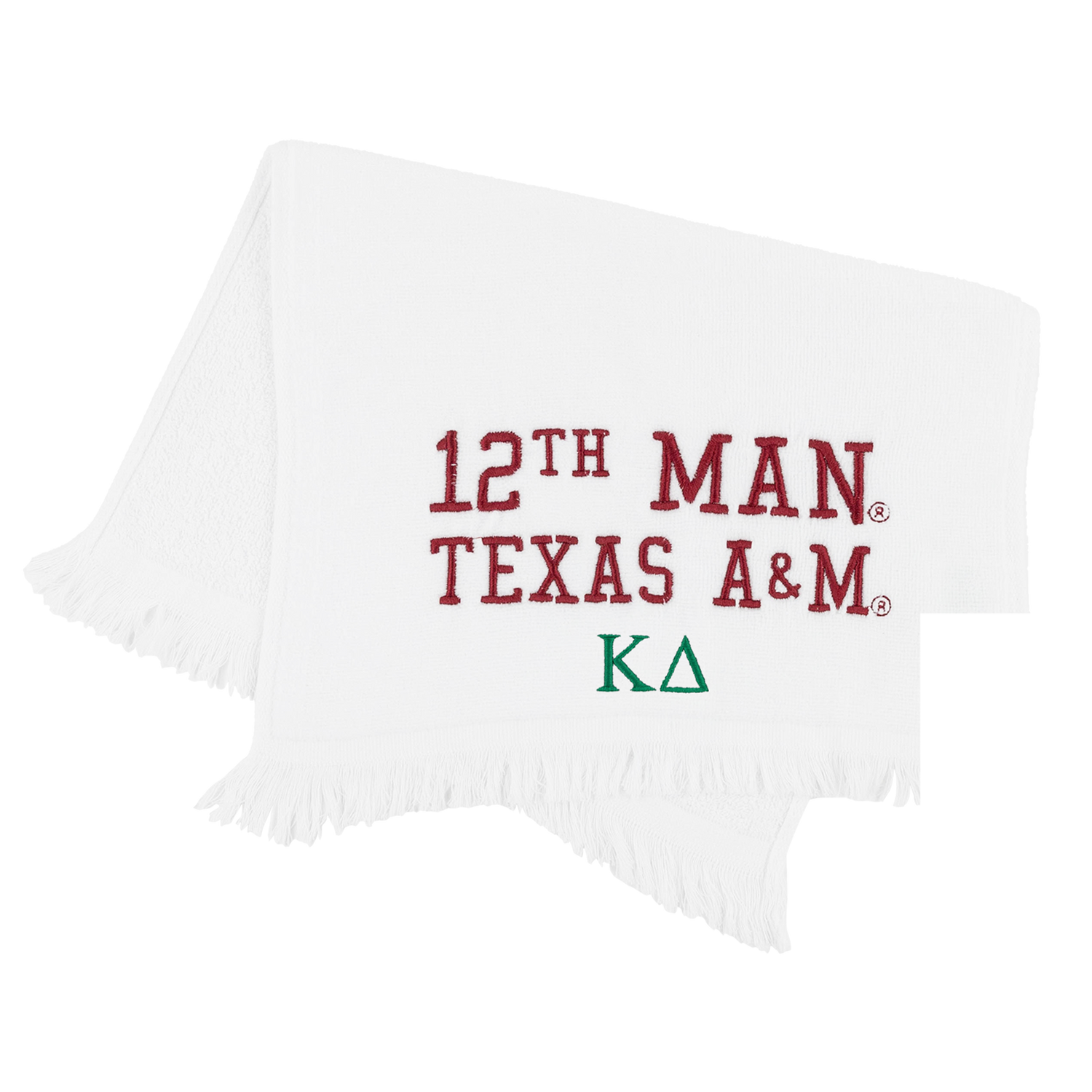 A white fringed towel featuring the text '12TH MAN TEXAS A&M' in dark red and the Greek letters 'KAΔ' in green.
