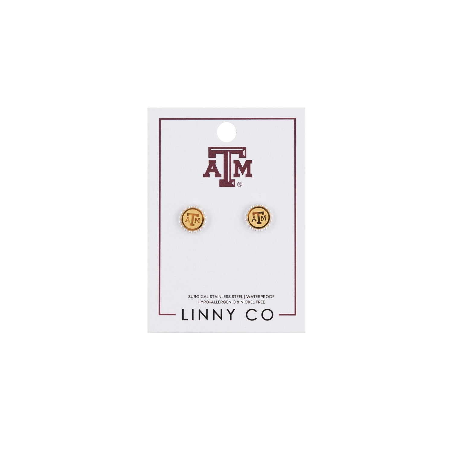 Gold earrings on a LINNY CO branded card with Texas A&M logo