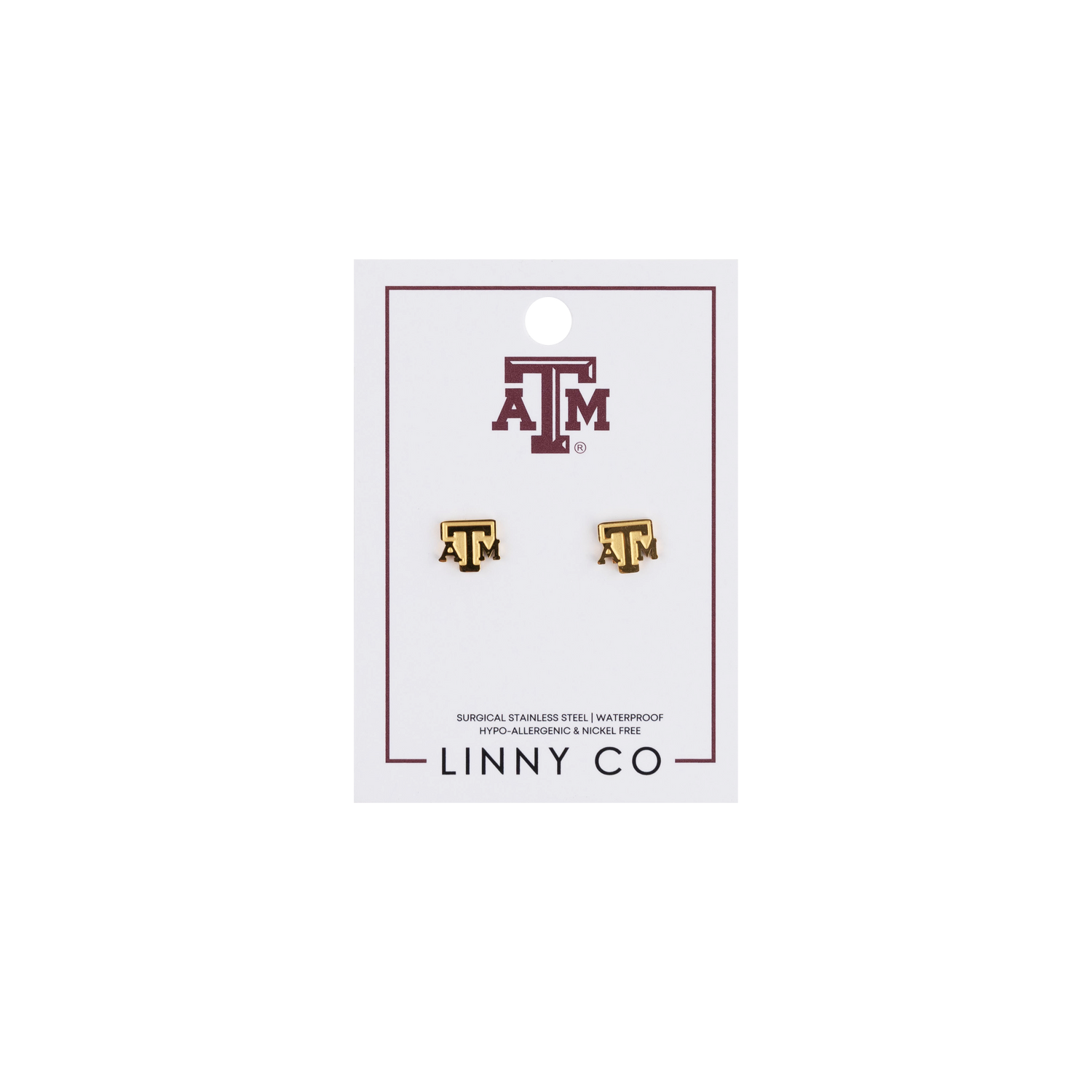 Pair of earrings on a LINNY CO branded card with 'ATM' logo.