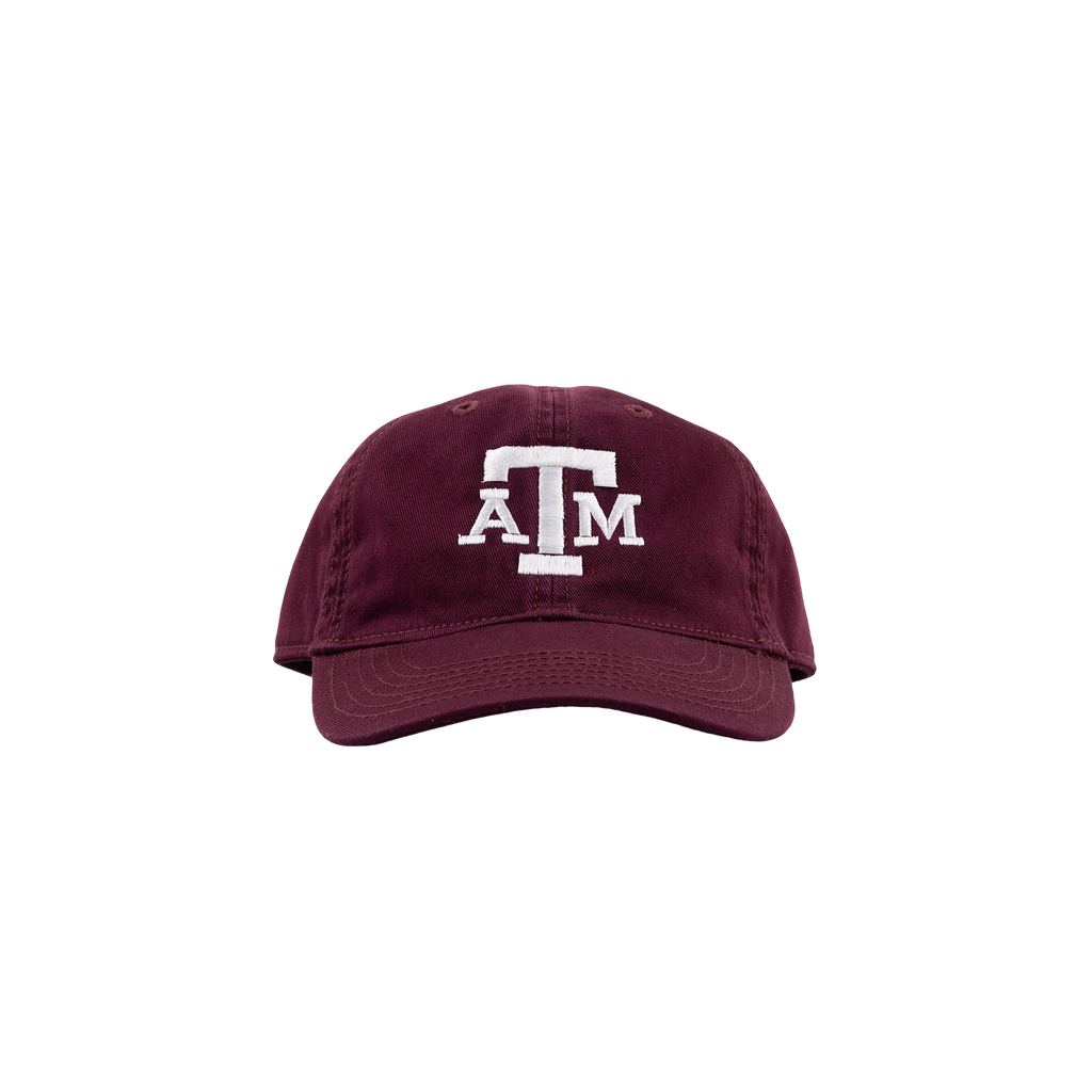 A maroon baseball cap featuring a white embroidered 'A&M' logo on the front