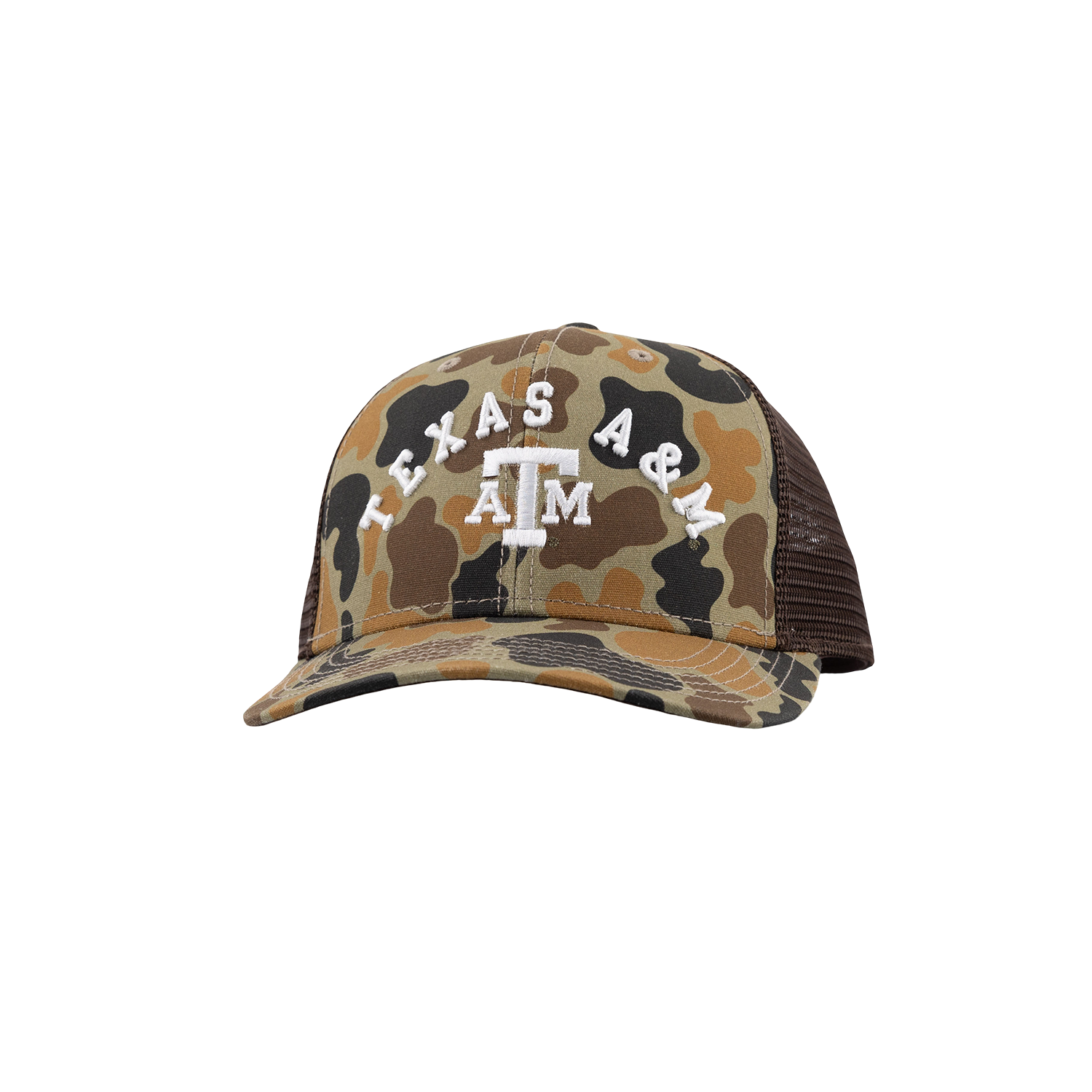 A Texas A&M University trucker hat featuring a tan, brown, and black camouflage pattern on the front panel and brim, with white embroidered 'TEXAS A&M' and 'A&M' logo on the front. The back mesh is dark brown.