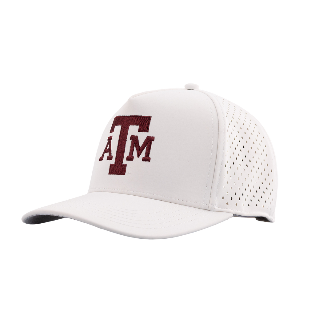 White baseball cap with maroon Texas A&M logo embroidered on front. 