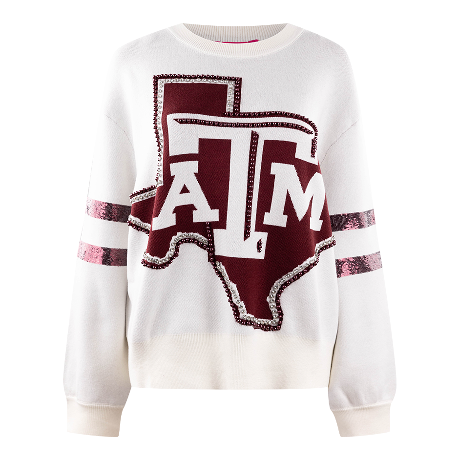 White sweater with the Texas A&M lonestar emblem in the middle of the sweater in maroon.
