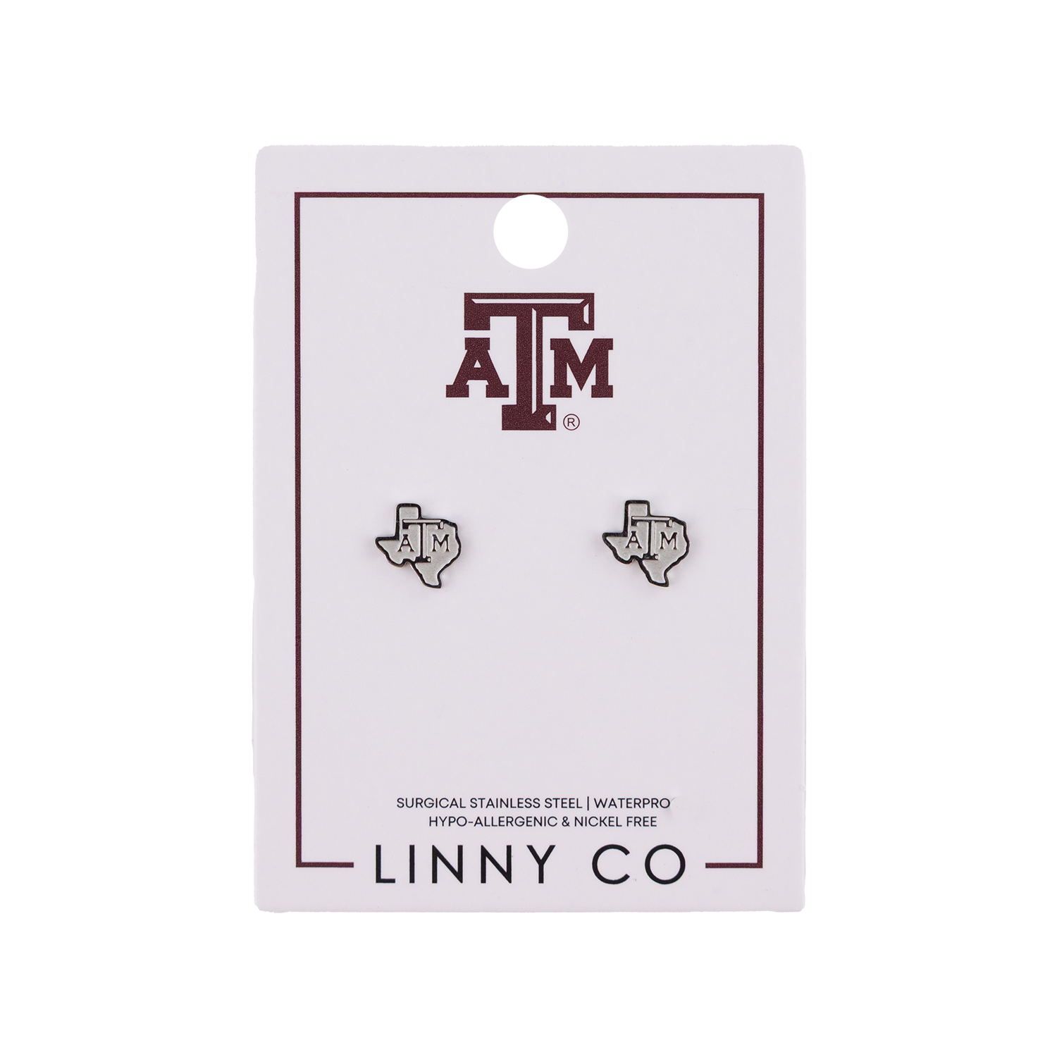A pair of Texas-shaped stud earrings with an 'A&M' logo, displayed on a white card backing featuring the Texas A&M logo and the brand name 'LINNY CO'.