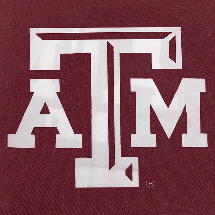 Maroon table cover with white, beveled ATM logo
